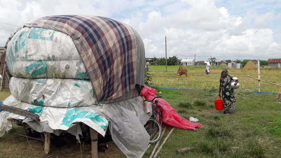 Community members have raised their assets and belongings to protect them from the floods after receiving flood early warning messages via voice SMS. Photo by Gobinda, VERC.