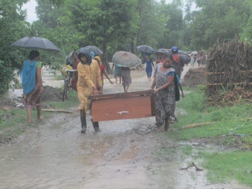 People forced to evacuate their homes during monsoon induced floods in Nepal. Photo by Practical Action